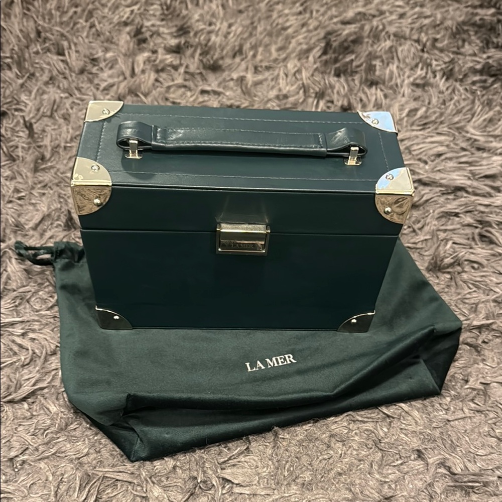 La Mer Green Cosmetic Case with Silver Accents